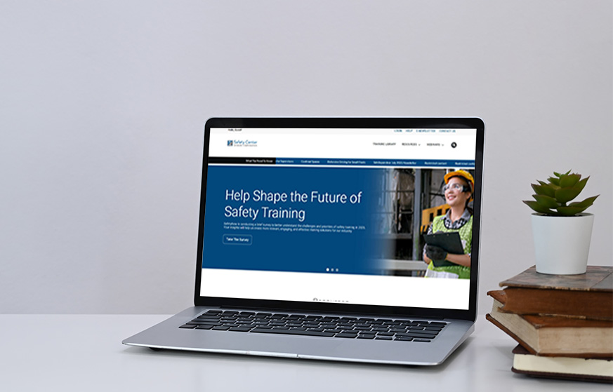 Laptop on desk with BHHC Safety Center on screen.