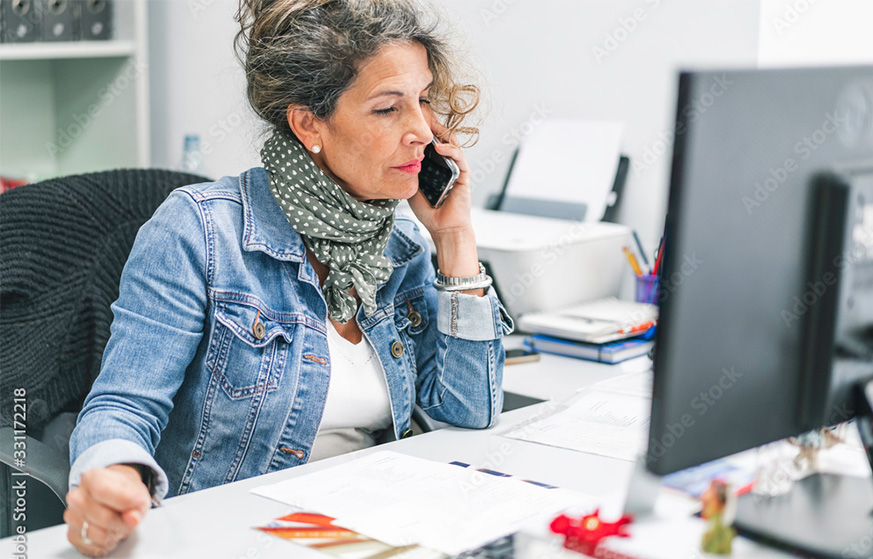 Group of people having a meeting in a well lit room.